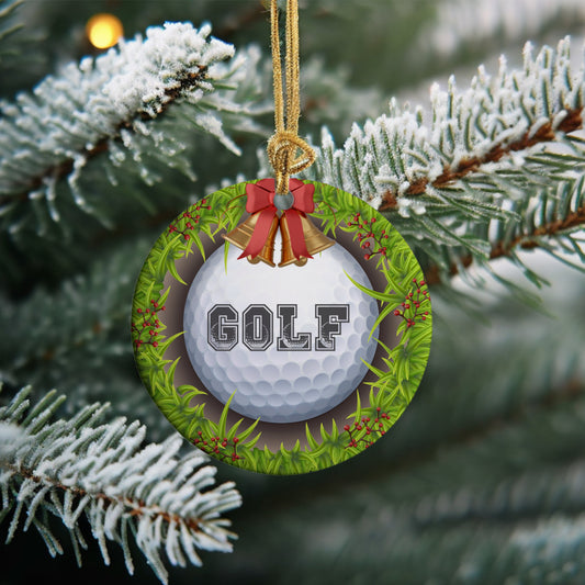 Golf Christmas ornament showcases a golf ball in the hole with the word Golf on it decorated with Christmas bells and berries.